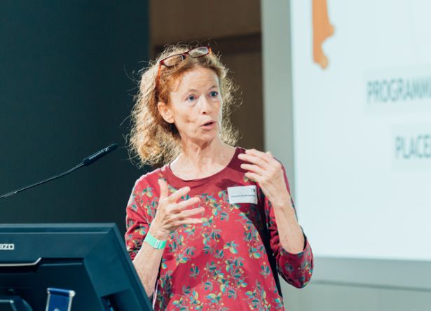 Lady with red dress during her presentation