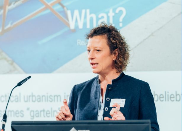 Lady with blue blazer during her presentation