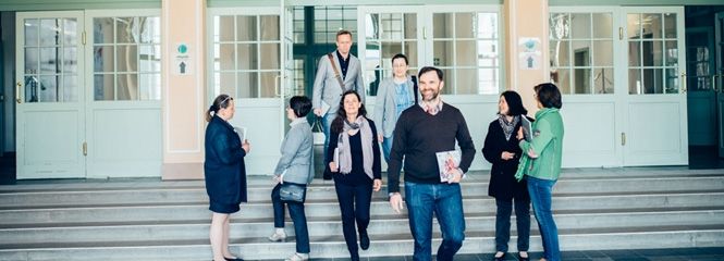 Students at the main entrance at the University for Continuing Education Krems