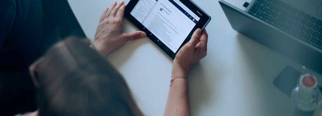 student surfing on tablet