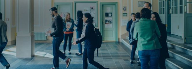 Students at the main entrance at University for Continuing Education Krems