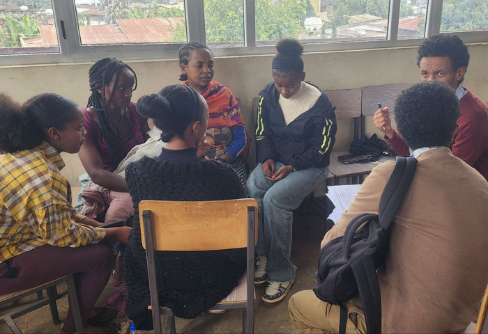 african people discussion in small groups