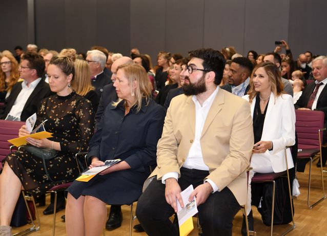 © Andrea Reischer Gäste sitzend im Audi Max