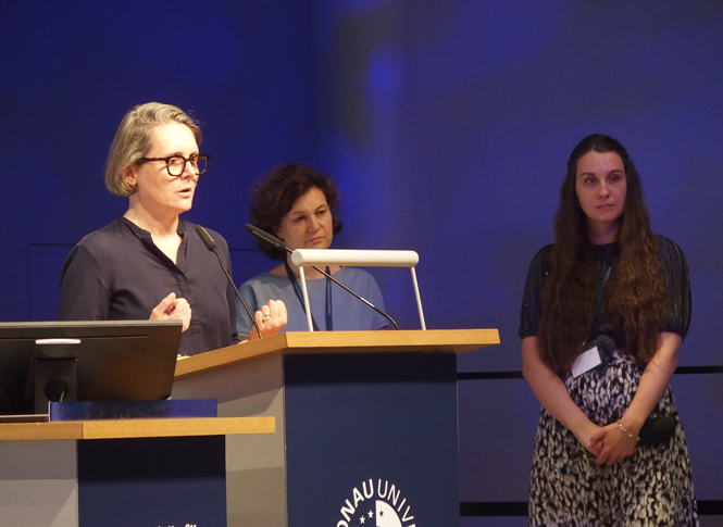 Vortragende auf der Bühne