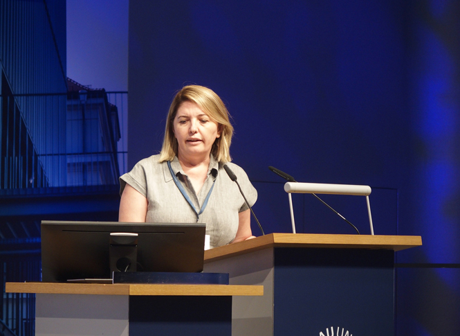 Vortragende auf der Bühne